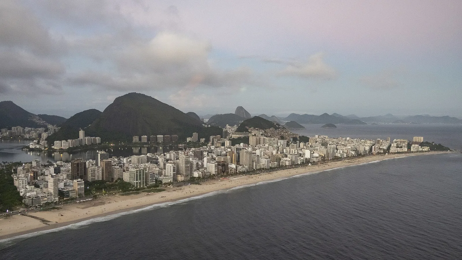 Ipanema and Leblon seen from the air at dusk, the Two Brothers mountain beyond