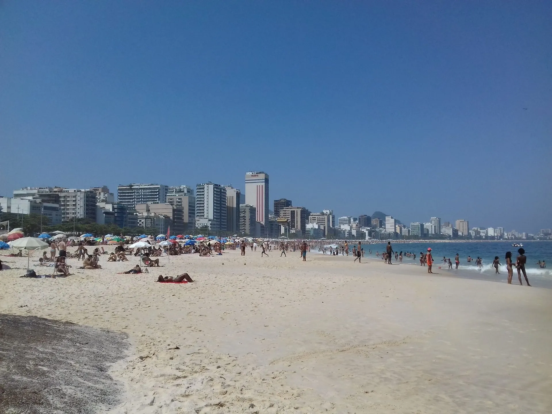 Leblon beach and its seafront apartment buildings in late-afternoon light